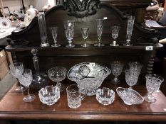 A collection of glassware, drinking glasses, bowls & vases etc.