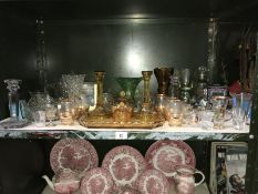 A shelf of assorted glassware including 2 dressing table sets