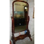 A large cheval mirror.