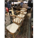 A set of 6 Ercol Windsor latticed dining chairs.