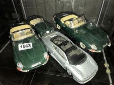 4 die cat Jaguar model cars, 2 Eclipse (XK120 adn XJ220), a Burago and a Mensto.