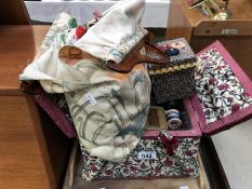 A sewing box and contents