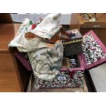 A sewing box and contents