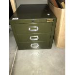 A small 3 drawer metal cabinet (locked)