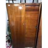 An Austinsuite half sliding door wardrobe