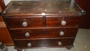 An old pine 2 over 2 chest of drawers.
