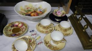 A collection of Aynsley cups and saucers in various designs,
