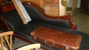 A mahogany chaise longue.