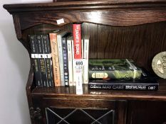 A collection of Ian Fleming, James Bond related books etc.