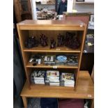 A small teak effect bookcase