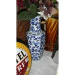 A blue and white vase.