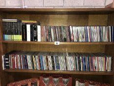 2 shelves of CDs