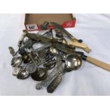 A quantity of silverplate spoons and knives etc