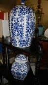 2 large blue and white ginger jars.