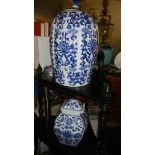 2 large blue and white ginger jars.