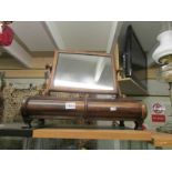 A Victorian mahogany toilet mirror with drawers.