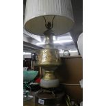 A large pair of table lamps with shades.