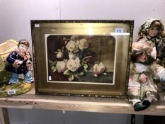 A framed and glazed floral picture