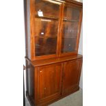 A glazed top dresser/bookcase.