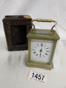 A small brass carriage clock in original case (case a/f).