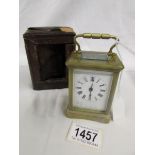 A small brass carriage clock in original case (case a/f).