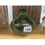 An Erik Hoglund green art glass vase with label.