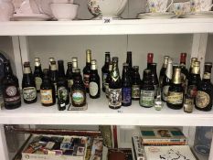 A shelf full of various bottled ales & beers