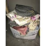 A box of fabric off-cuts & table cloths