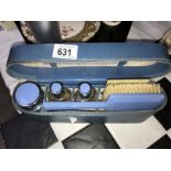 A cased deco vanity set