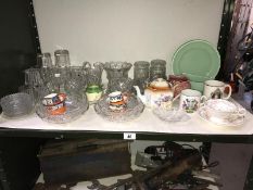 A collection of glass vases and drinking vessels plus some porcelain items