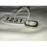 A 10 stone white gold diamond bar ring, size M.
