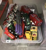 A box of toy cars and vehicles including Hotwheels, matchbox etc.