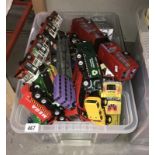 A box of toy cars and vehicles including Hotwheels, matchbox etc.