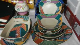 13 pieces of Rosenthal Studio Line Dorothy Hafner design dinner ware including plates and tureen.