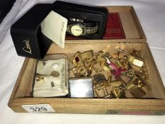 A Limit wristwatch and a quantity of cufflinks