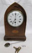 A Mappin and Webb inlaid mantel clock.