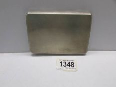 A silver cigarette case, hall marked 1946/47, approximately 6.75 ounces.