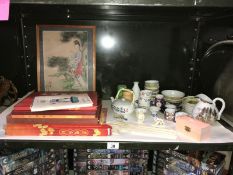 A collection of oriental items including picture, books, bowls, jug, teapot etc.