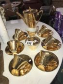 A Bavaman gold porcelain coffee set