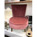 A Pink fabric coloured tub chair