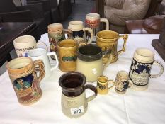 A small collection of stoneware tankards