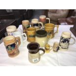 A small collection of stoneware tankards