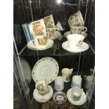 2 shelves of commemorative china etc.