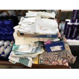 A large quantity of household linen including tablecloths, towels, lace mats etc.