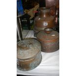 A Bedouin copper spice box with containers, a copper urn and a copper pot with lid.