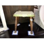 A small 4 legged stool