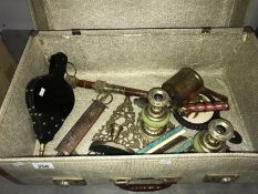 A box of miscellaneous including candlesticks, bellows & boxed harmonica etc.