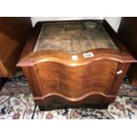 A carved wood box commode