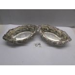 A pair of ornate silver bon bon dishes, London 1902/03, 6.75 ounces.