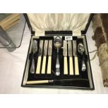 A cased cutlery set